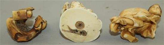 A Japanese ivory netsuke and two similar okimono